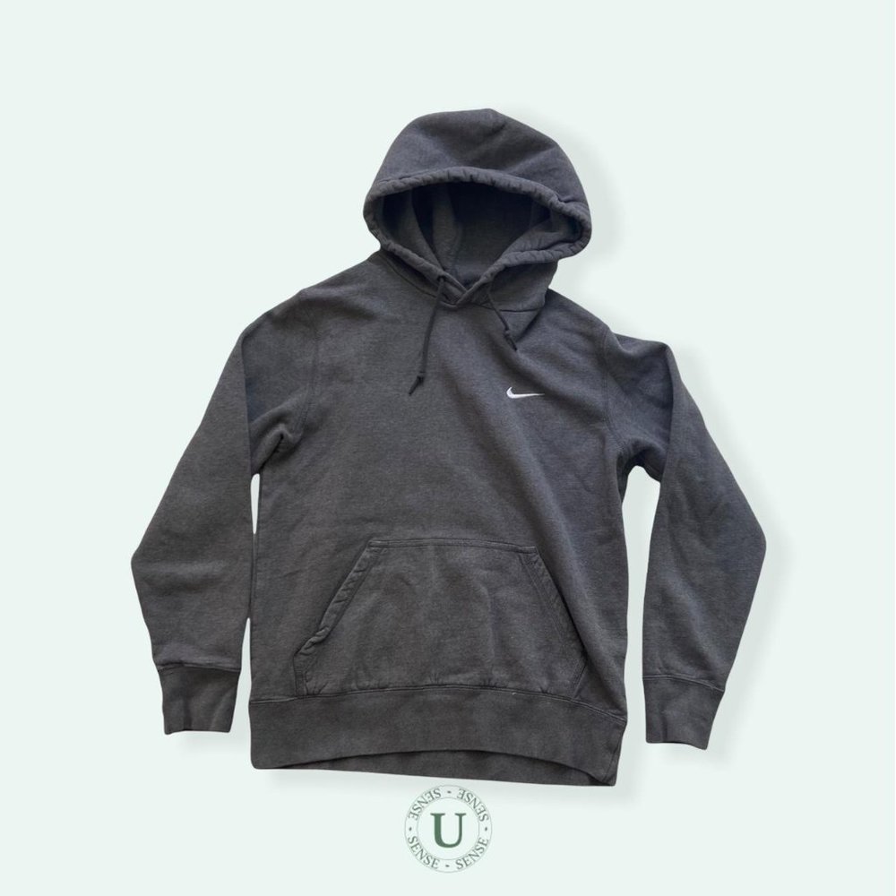 Charcoal Gray Nike Hoodie. Great condition. Metal tips on the strings.